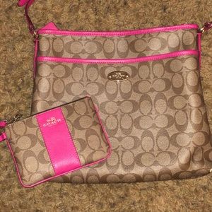 Pink-Coach purse and wristlet.